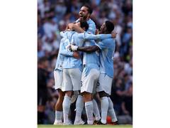 Manchester City débute la saison de Premier League par une victoire 2-1 contre Bournemouth après un retour.